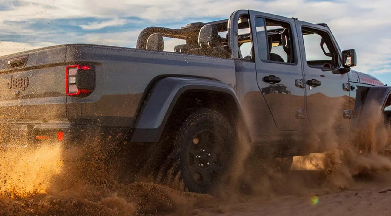 Jeep Gladiator vs RAM 1500 adventure comparison near Boston MA